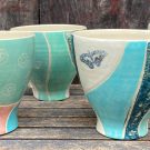 Kobrow-Tassen-breit-tuerkis-Schm-scaled